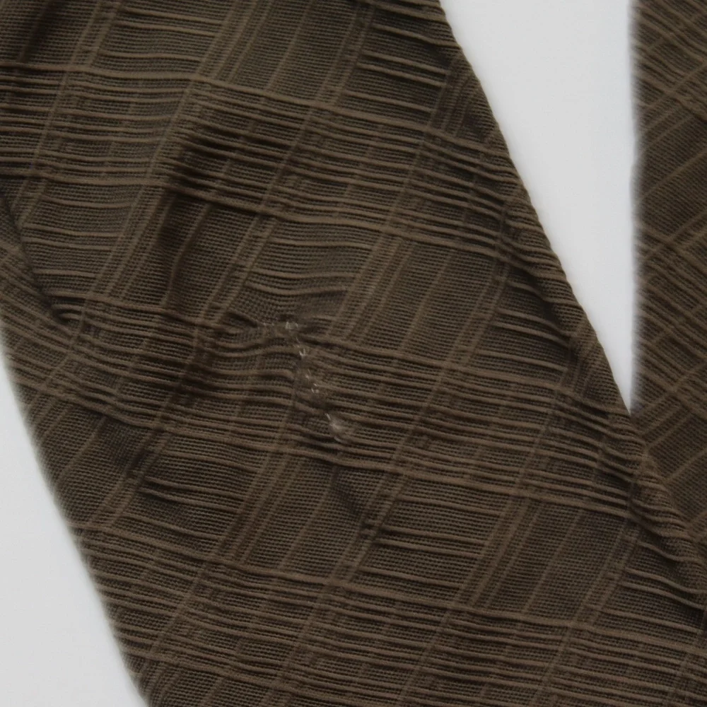 Tights in brown cross-hatched pattern